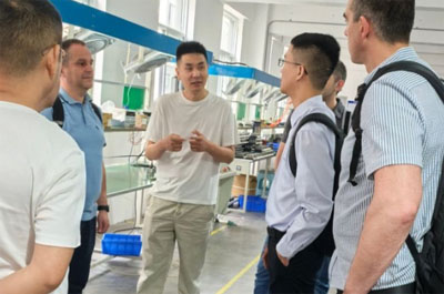 Overseas client touring the CNG and LPG reducer production line.jpg