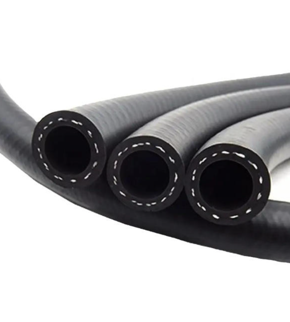 Custom-cut rubber fuel hose used for old car aftermarket replacement in auto repair shop
